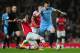 LONDON, ENGLAND - MARCH 29: Alvaro Negredo of Manchester City is closed down by Tomas Rosicky and Alex Oxlade-Chamberlain of Arsenal during the Barclays Premier League match between Arsenal and Manchester City at Emirates Stadium on March 29, 2014 in London, England. (Photo by Shaun Botterill/Getty Images)
