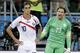 Netherlands' goalkeeper Tim Krul, right, celebrates after saving from Costa Rica's Bryan Ruiz in a penalty shoot out during the World Cup quarterfinal soccer match between the Netherlands and Costa Rica at the Arena Fonte Nova in Salvador, Brazil, Saturday, July 5, 2014. The Netherlands won 4-3 0n penalties after the match ended 0-0 after extra time. (AP Photo/Matt Dunham)