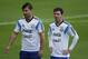 Argentina's Lionel Messi, right, walks next to teammate Sergio Aguero during a training session in Vespasiano, near Belo Horizonte, Brazil, Thursday, June 12, 2014. Argentina will play in group F of the Brazil 2014 soccer World Cup. (AP Photo/Victor R. Caivano)