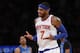New York Knicks' Carmelo Anthony (7) reacts after hitting a 3-point shot against the Dallas Mavericks during the second half of an NBA basketball game Monday, Feb. 24, 2014, in New York. Dallas won 110-108. (AP Photo/Jason DeCrow)