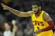 Apr 5, 2014; Cleveland, OH, USA; Cleveland Cavaliers guard Kyrie Irving (2) celebrates a three-point basket in the first quarter against the Charlotte Bobcats at Quicken Loans Arena. Mandatory Credit: David Richard-USA TODAY Sports
