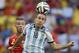 Argentina's Rodrigo Palacio wins a header during the World Cup quarterfinal soccer match between Argentina and Belgium at the Estadio Nacional in Brasilia, Brazil, Saturday, July 5, 2014. (AP Photo/Martin Meissner)