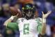 Oregon's Marcus Mariota throws to prepare for the Valero Alamo Bowl NCAA college football game against Texas, Monday, Dec. 30, 2013, in San Antonio. (AP Photo/Eric Gay)
