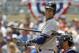 New York Yankees' Derek Jeter looks to third base coach Rob Thomson during the first inning of a baseball game against the Minnesota Twins in Minneapolis, Sunday, July 6, 2014. (AP Photo/Ann Heisenfelt)