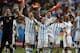 CORRECTS PHOTOGRAPHER'S BYLINE - Argentina's Lionel Messi and teammates celebrate at the end of the World Cup quarterfinal soccer match between Argentina and Belgium at the Estadio Nacional in Brasilia, Brazil, Saturday, July 5, 2014. Argentina won 1-0. (AP Photo/Eraldo Peres)