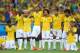 BELO HORIZONTE, BRAZIL - JUNE 28: (L-R) Thiago Silva, Luiz Gustavo, Ramires, Dani Alves, Jo, Marcelo, Hulk, Willian and Neymar of Brazil look on during a penalty shootout during the 2014 FIFA World Cup Brazil round of 16 match between Brazil and Chile at Estadio Mineirao on June 28, 2014 in Belo Horizonte, Brazil. (Photo by Paul Gilham/Getty Images)