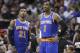 New York Knicks guard Iman Shumpert (21) and forward Amar'e Stoudemire (1) look on during the second half of an NBA basketball game against the Miami Heat, Sunday, April 6, 2014 in Miami. The Heat defeated the Knicks 102-91. (AP Photo/Wilfredo Lee)