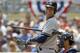 New York Yankees' Derek Jeter looks to third base coach Rob Thomson during the first inning of a baseball game against the Minnesota Twins in Minneapolis, Sunday, July 6, 2014. (AP Photo/Ann Heisenfelt)