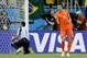 Netherlands' Robin van Persie celebrates after scoring in a penalty shoot out during the World Cup quarterfinal soccer match between the Netherlands and Costa Rica at the Arena Fonte Nova in Salvador, Brazil, Saturday, July 5, 2014. (AP Photo/Matt Dunham)