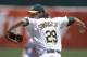 Oakland Athletics' Jeff Samardzija works against the Toronto Blue Jays in the first inning of a baseball game Sunday, July 6, 2014, in Oakland, Calif. (AP Photo/Ben Margot)