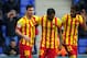 FC Barcelona's Lionel Messi, left, celebrates after scoring a penalty with teammates Neymar, right, and Daniel Alves, center, during a Spanish La Liga soccer match against Espanyol at Cornella-El Prat stadium in Cornella Llobregat, Spain, Saturday, March 29, 2014. (AP Photo/Manu Fernandez)