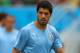 NATAL, BRAZIL - JUNE 24: Luis Suarez of Uruguay warms up ahead of the 2014 FIFA World Cup Brazil Group D match between Italy and Uruguay at Estadio das Dunas on June 24, 2014 in Natal, Brazil. (Photo by Clive Rose/Getty Images)