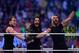 The Shield reacts after their win during Wrestlemania XXX at the Mercedes-Benz Super Dome in New Orleans on Sunday, April 6, 2014. (Jonathan Bachman/AP Images for WWE)