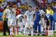 Argentina's Gonzalo Higuain, left, and Lionel Messi react after Angel di Maria was injured during the World Cup quarterfinal soccer match between Argentina and Belgium at the Estadio Nacional in Brasilia, Brazil, Saturday, July 5, 2014. (AP Photo/Martin Meissner)