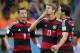 Germany's Thomas Mueller blows a kiss as he celebrates after scoring the opening goal during the World Cup semifinal soccer match between Brazil and Germany at the Mineirao Stadium in Belo Horizonte, Brazil, Tuesday, July 8, 2014. (AP Photo/Frank Augstein)