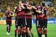 BELO HORIZONTE, BRAZIL - JULY 08: Thomas Mueller of Germany celebrates scoring his team's first goal with teammates during the 2014 FIFA World Cup Brazil Semi Final match between Brazil and Germany at Estadio Mineirao on July 8, 2014 in Belo Horizonte, Brazil. (Photo by Buda Mendes/Getty Images)