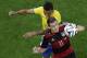 Germany's Miroslav Klose and Brazil's Luiz Gustavo fight for the ball during the World Cup semifinal soccer match between Brazil and Germany at the Mineirao Stadium in Belo Horizonte, Brazil, Tuesday, July 8, 2014. (AP Photo/Felipe Dana, Pool)