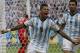 Argentina's Marcos Rojo celebrates scoring his side's third goal during the group F World Cup soccer match between Nigeria and Argentina at the Estadio Beira-Rio in Porto Alegre, Brazil, Wednesday, June 25, 2014. (AP Photo/Fernando Vergara)