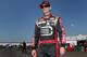 SPARTA, KY - JUNE 27: Jeff Gordon, driver of the #24 Drive to End Hunger Chevrolet, walks in the garage area during practice for the NASCAR Sprint Cup Series Quaker State 400 presented by Advance Auto Parts at Kentucky Speedway on June 27, 2014 in Sparta, Kentucky. (Photo by Christian Petersen/Getty Images)