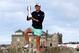 Stacy Lewis of the US poses with the trophy after winning Women's British Open golf championship on the Old Course at St Andrews, Scotland, Sunday Aug. 4, 2013. (AP Photo/Scott Heppell)