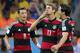 Germany's Thomas Mueller blows a kiss as he celebrates after scoring the opening goal during the World Cup semifinal soccer match between Brazil and Germany at the Mineirao Stadium in Belo Horizonte, Brazil, Tuesday, July 8, 2014. (AP Photo/Frank Augstein)