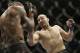 Glover Teixeira, right, fights Quinton Jackson during UFC Light Heavyweight Championship on FOX 6 at the United Center in Chicago, Saturday, Jan. 26, 2013. Teixeira won the bout. (AP Photo/Nam Y. Huh)