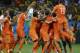 Netherlands' players celebrate after winning on penalty kicks the World Cup quarterfinal soccer match between the Netherlands and Costa Rica at the Arena Fonte Nova in Salvador, Brazil, Saturday, July 5, 2014. The Netherlands won 4-3. Late substitute Tim Krul, center right, made two saves in a 4-3 penalty shootout victory over Costa Rica on Saturday to give the Netherlands a spot in the World Cup semifinals following a 0-0 draw.(AP Photo/Hassan Ammar)