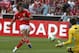 Benfica's Lazar Markovic, from Serbia, scores past Gil Vicente's goalkeeper Adriano Fachini, right, from Brazil, during their Portuguese league soccer match at Benfica's Luz stadium in Lisbon, Sunday, Aug. 25, 2013. Markovic scored once in Benfica's 2-1 win. (AP Photo/Francisco Seco)