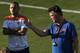 Netherlands' coach Louis van Gaal, right, gives instructions as Wesley Sneijder listens to him during a training session, Sunday, July 6, 2014, in Rio de Janeiro, Brazil. The Netherlands play their semifinal match of the 2014 World Cup soccer tournament against Argentina on July 9 in Sao Paulo. (AP Photo/Silvia Izquierdo)