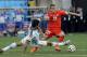 Switzerland's Xherdan Shaqiri is challenged during the World Cup round of 16 soccer match between Argentina and Switzerland at the Itaquerao Stadium in Sao Paulo, Brazil, Tuesday, July 1, 2014. (AP Photo/Sergei Grits)