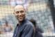 New York Yankees shortstop Derek Jeter laughs before a baseball game against the Minnesota Twins in Minneapolis, Sunday, July 6, 2014. (AP Photo/Ann Heisenfelt)