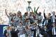 TURIN, ITALY - MAY 18: The Juventus FC players celebrate with the Serie A trophy at the end of the Serie A match between Juventus and Cagliari Calcio at Juventus Arena on May 18, 2014 in Turin, Italy. (Photo by Valerio Pennicino/Getty Images)