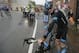 Britain's Christopher Froome grimaces as he gets up after a third consecutive crash in two days prior to abandoning the race during the fifth stage of the Tour de France cycling race over 155 kilometers (96.3 miles) with start in Ypres, Belgium, and finish in Arenberg, France, Wednesday, July 9, 2014. The stage initially contained nine sectors of cobblestone roads dreaded by the majority of the riders in the pack especially under wet conditions, the organization decided to cancel two of the nine stretches because of the weather. (AP Photo/Laurent Cipriani)