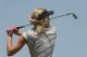 Jun 15, 2014; Pinehurst, NC, USA; LPGA player Lexi Thompson hits tee shots on the practice ground during the final round of the 2014 U.S. Open golf tournament at Pinehurst Resort Country Club - #2 Course. Mandatory Credit: Kyle Terada-USA TODAY Sports