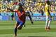 Chile's Alexis Sanchez celebrates after scoring his side's first goal during the World Cup round of 16 soccer match between Brazil and Chile at the Mineirao Stadium in Belo Horizonte, Brazil, Saturday, June 28, 2014. (AP Photo/Manu Fernandez)