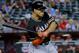 Florida Marlins' Giancarlo Stanton hits against the Arizona Diamondbacks during the first inning of a baseball game, Monday, July 7, 2014, in Phoenix. (AP Photo/Matt York)