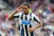 Newcastle United's Loic Remy celebrates his goal during their English Premier League soccer match against Cardiff City at St James' Park, Newcastle, England, Saturday, May 3, 2014. (AP Photo/Scott Heppell)