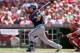 CINCINNATI, OH - JULY 05: Jonathan Lucroy #20 of the Milwaukee Brewers hits a double in the first inning during the game against the Cincinnati Reds at Great American Ball Park on July 5, 2014 in Cincinnati, Ohio. (Photo by Andy Lyons/Getty Images)