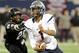 Allen quarterback Kyler Murray (1) runs upfield past Pearland Marlon Walls (28) in the first half during a UIL Class 5A Division I high school football championship game on Saturday Dec. 21, 2013, in Arlington, Texas. (AP Photo/Matt Strasen)