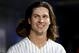 NEW YORK, NY - JULY 08: Jacob deGrom #48 of the New York Mets looks on from the dugout in the seventh inning against the Atlanta Braves on July 8, 2014 at Citi Field in the Flushing neighborhood of the Queens borough of New York City. (Photo by Elsa/Getty Images)
