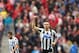 Newcastle United's Mathieu Debuchy celebrates his goal during their English Premier League soccer match against Sunderland at the Stadium of Light, Sunderland, England, Sunday, Oct. 27, 2013. (AP Photo/Scott Heppell)