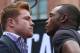LOS ANGELES, CA - MAY 06: Boxers Canelo Alvarez (L) and Erislandy Lara face off onstage prior to the press conference for Canelo Alvarez v Erislandy Lara on May 6, 2014 in Los Angeles, California. (Photo by Victor Decolongon/Getty Images)