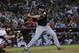 Florida Marlins' Giancarlo Stanton hits against the Arizona Diamondbacks during the second inning of a baseball game, Monday, July 7, 2014, in Phoenix. (AP Photo/Matt York)