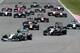 NORTHAMPTON, ENGLAND - JULY 06: Nico Rosberg of Germany and Mercedes GP leads Jenson Button of Great Britain and McLaren into the first corner before the re-start during the British Formula One Grand Prix at Silverstone Circuit on July 6, 2014 in Northampton, United Kingdom. (Photo by Mark Thompson/Getty Images)