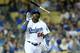 LOS ANGELES, CA - JUNE 30: Yasiel Puig #66 of the Los Angeles Dodgers tosses his bat after popping up in the sixth inning the Cleveland Indians at Dodger Stadium on June 30, 2014 in Los Angeles, California. (Photo by Stephen Dunn/Getty Images)