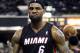 FILE - In this Dec. 27, 2013 file photo, Miami Heat forward LeBron James reacts after scoring and drawing a foul against the Sacramento Kings during the first half of an NBA basketball game, in Sacramento, Calif. The wait continues for the next decision. At stake for LeBron James: Where he plays for the next few seasons, and which fan base _ the already-scorned one in Cleveland or the panicked one in Miami _ will undoubtedly feel alienated by whatever choice his latest foray into free agency leads him to make. (AP Photo/Steve Yeater, File)