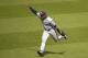 Milwaukee Brewers center fielder Carlos Gomez (27) celebrates after catching a fly ball to center field by Pittsburgh Pirates' Josh Harrison for the final out of the ninth inning of a baseball game in Pittsburgh Sunday, June 8, 2014. The Brewers won 1-0. (AP Photo/Gene J. Puskar)
