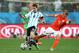 SAO PAULO, BRAZIL - JULY 09: Lionel Messi of Argentina is tackled by Dirk Kuyt of the Netherlands during the 2014 FIFA World Cup Brazil Semi Final match between the Netherlands and Argentina at Arena de Sao Paulo on July 9, 2014 in Sao Paulo, Brazil. (Photo by Dean Mouhtaropoulos/Getty Images)