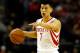 HOUSTON, TX - APRIL 04: Jeremy Lin #7 of the Houston Rockets points down court against the Oklahoma City Thunder during a game at the Toyota Center on April 4, 2014 in Houston, Texas. NOTE TO USER: User expressly acknowledges and agrees that, by downloading and or using this photograph, User is consenting to the terms and conditions of the Getty Images License Agreement. (Photo by Scott Halleran/Getty Images)