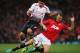 MANCHESTER, ENGLAND - SEPTEMBER 25: Jonny Evans of Manchester United tackles Luis Suarez of Liverpool during the Capital One Cup Third Round match betwen Manchester United and Liverpool at Old Trafford on September 25, 2013 in Manchester, England. (Photo by Julian Finney/Getty Images)